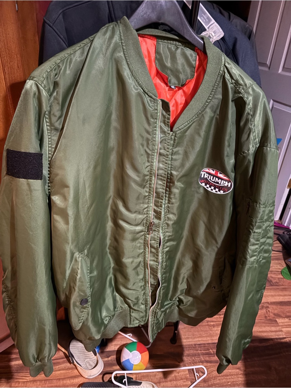 Triumph Olive Green Bomber Jacket with Orange Lining Patch